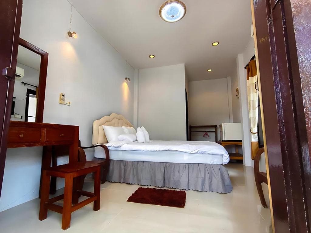 Comfortable bedroom at A-Thip House Pai